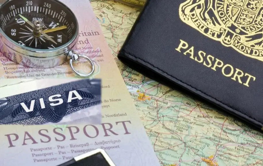 A passport being stamped at an immigration counter.